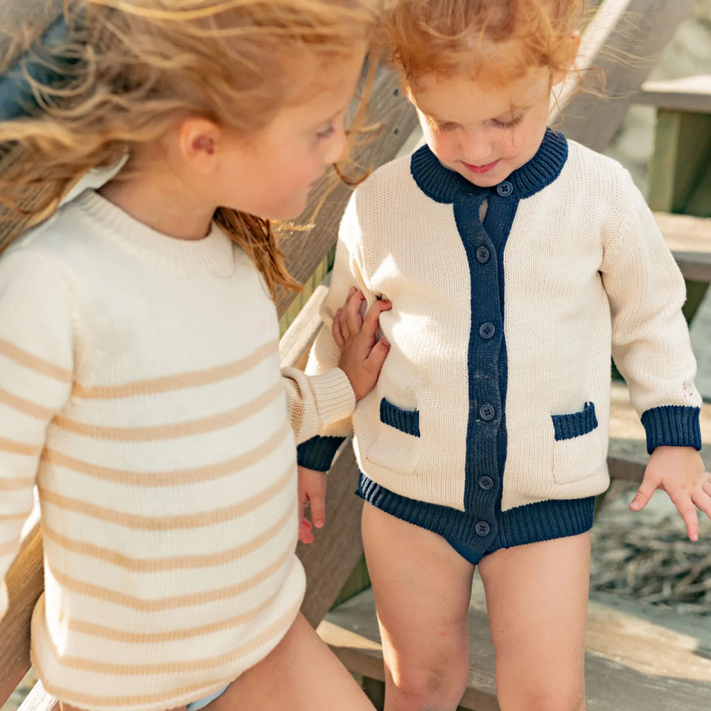 unisex cream and navy trim knit cardigan